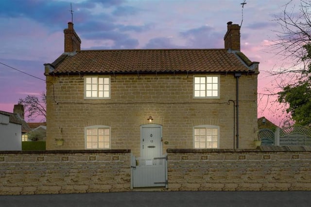 The £375,000 cottage looks just as impressive when the night closes in.