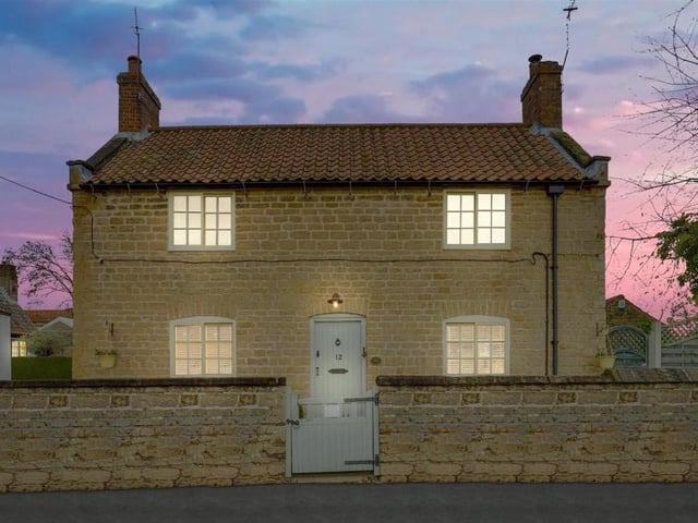 The £375,000 cottage looks just as impressive when the night closes in.