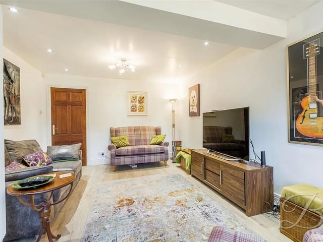 An additional reception room offering ample space for all your desired furnishings. Fitted with a window to the rear, velux window and patio doors opening externally to the side elevation.