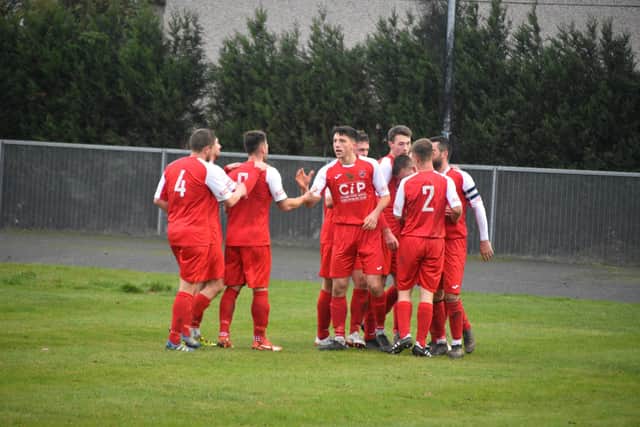 Ross Duggan opens the scoring in the 1-1 draw with Penistone Church.