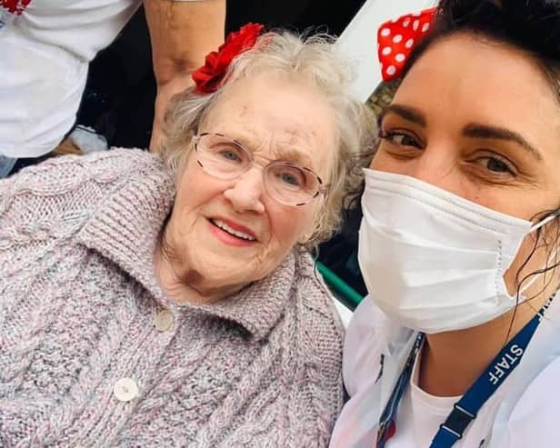 Natasha with a resident