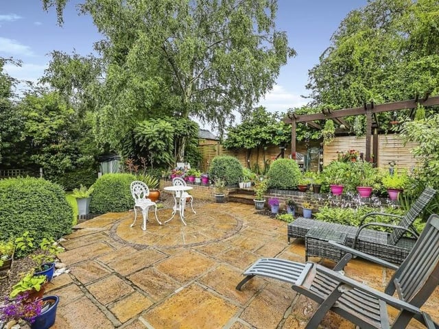 The garden features pleasant individual seating areas scattered all over the place, with decked and patio spaces. Fully enclosed, it offers a high degree of privacy too.