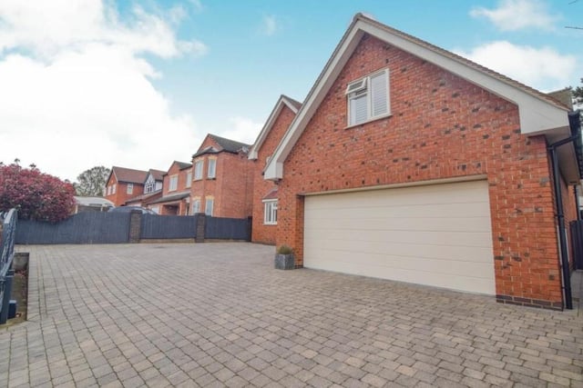Time to take in the excellence of the exterior now, beginning with the impressive double garage. It stands proudly on a driveway that offers off-street parking space for many vehicles.