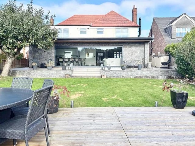 The garden boasts a number of patio seating areas, perfect for alfresco entertaining.