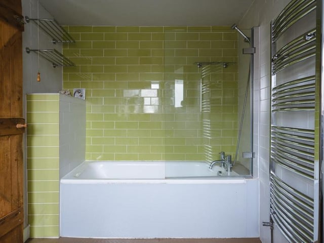 On a half-landing at the £575,000 property sits this good-sized family bathroom. What a fantastic bath, don't you think?