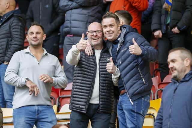 Travelling Stags fans watch the Sky Bet League 2 match against Bradford City.