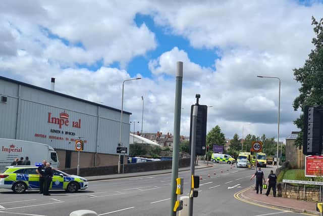 The road is closed and drivers are urged to avoid the area