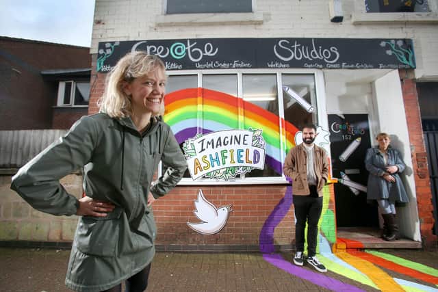 Jayne Woodbridge (right) owner of the Create Studio in Sutton-in-Ashfield, Nottinghamshire, paints her shop front with a giant rainbow as part of Imagine Ashfield, a community project inviting residents to imagine what the area will look like after the pandemic.