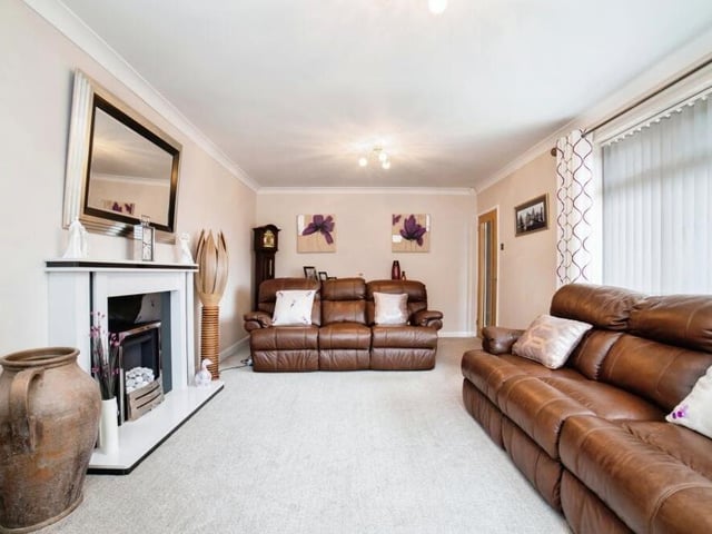 As you step inside the £300,000 Sutton bungalow, a narrow entrance hall leads the way and the first room you come across is this superb and spacious lounge. Sit back and relax.
