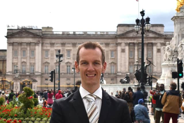 Shirebrook man James Taylor, ardent devotee of the Royal Family, pictured outside Buckingham Palace.