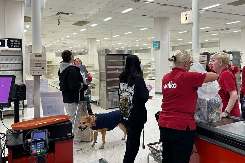 Staff served their final customers of the day. The Mansfield store was one of 248 Wilko stores across the UK that welcomed dogs inside.