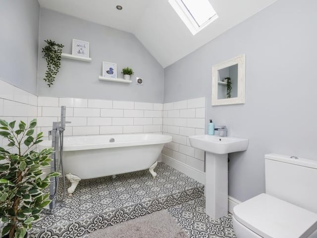 The family bathroom on the first floor of the £375,000 house is a superb space, with plenty of character. It is fitted with a roll-top bath, wash hand basin and WC.