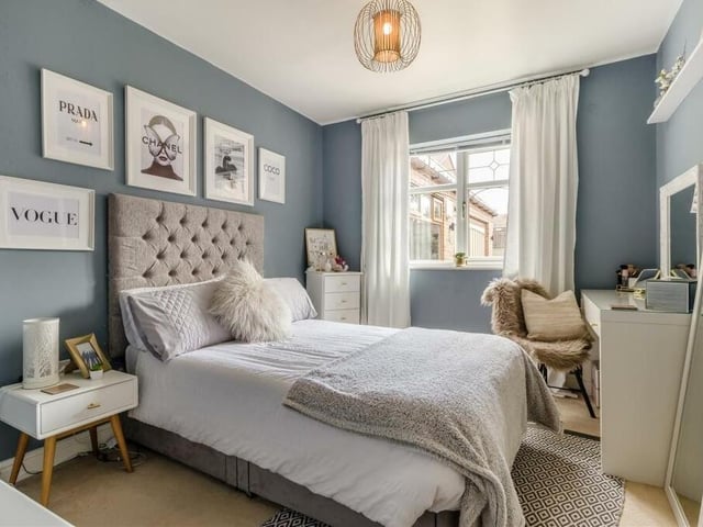 The second bedroom is also impressive, with windows to the side and front of the bungalow. It boasts fitted wardrobes with hanging rails and shelves.
