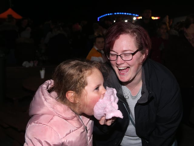 Pictured in 2019 Mum Deborah Parkin laughs as daughter Sophie-Anne has a face full of candy floss.