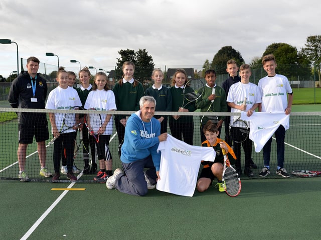 Students from Brunts Academy presented with t-shirts after completing 30 hours of tennis coaching in association with Mansfield Lawn Tennis Club, pictured are pupils with head coach Andy Mcfeeters and teacher Mr Paling.