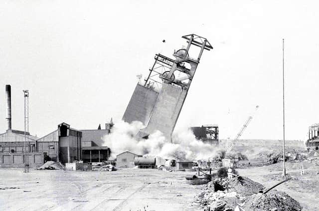 Shirebrook Colliery headstocks are demolished in 1993, following the pit's closure in May that year.