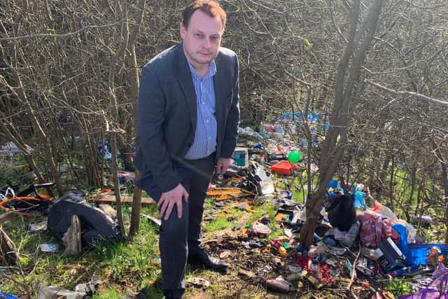 Coun Jason Zadrozny at the fly tip site