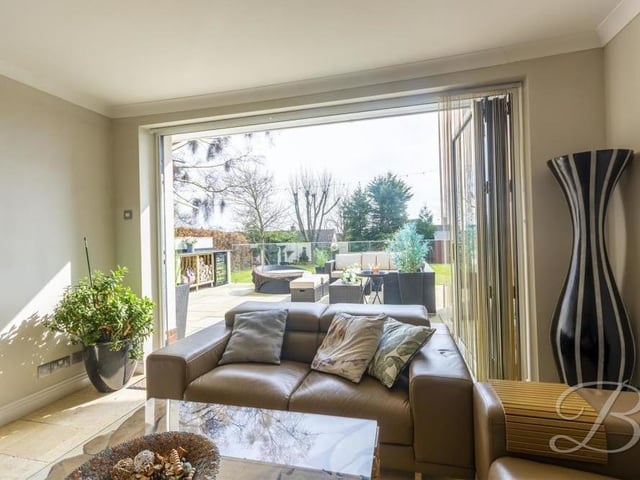 The scene when the French doors of the lounge are opened up and you can step conveniently into the garden. Ideal if you are entertaining family and friends in the summer.