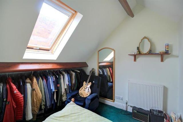 All four upstairs bedrooms have an angled ceiling due to their position in the converted church.