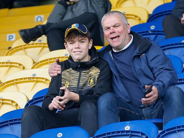 Mansfield Town fans watch the Sky Bet League 2 match against Forest Green Rovers FC at the One Call Stadium, 07 May 2022  Photo credit : Chris Holloway / The Bigger Picture.media