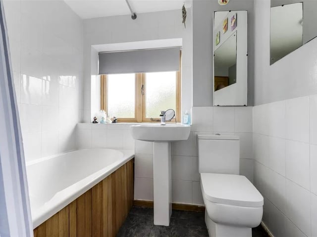 One of two bathrooms in the well appointed property.