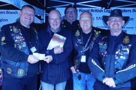 Andy Smart is pictured, second left, with Notts Royal British Legion fundraiser AJ Wilcox, left, and members of the Ashfield branch of the RBL Riders, as he presents a cheque for £250 to the Poppy Appeal.