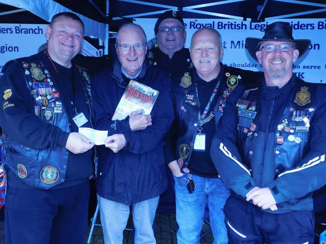 Andy Smart is pictured, second left, with Notts Royal British Legion fundraiser AJ Wilcox, left, and members of the Ashfield branch of the RBL Riders, as he presents a cheque for £250 to the Poppy Appeal.