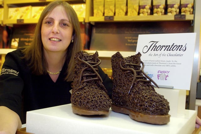 Chocolate shoes pictured with Sharon Morley, Thorntons Store Manager, Meadowhall as part of teh Fit Feet campaign