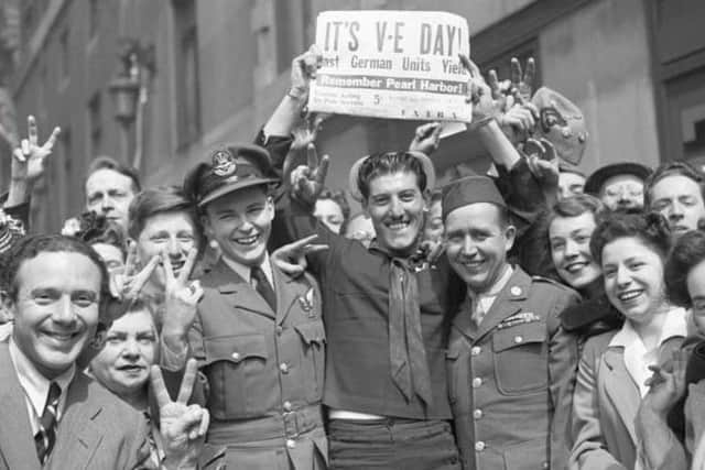 People celebrating VE Day 75 years ago