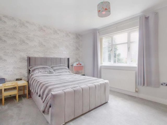 The third bedroom, which faces the front of the £484,950-plus property, also has access to a Jack and Jill shower room. The floor is carpeted.