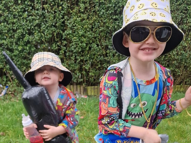Laura Birks from Mansfield shared a photo of Kobi, aged 5, who participated in an 80s dress-up day. Brody, aged 2, had a PJ day. They both wore odd socks for World Down Syndrome Day as well.
