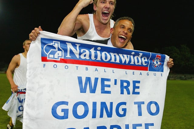 Liam Lawrence and Keith Curle celebrate. Lawrence scored with Mansfield's second penalty. He wasn't quite so lucky with his cheeky second penalty in the play-off final.
