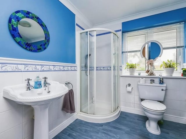 The first floor of the £600,000-plus property houses a bathroom for the whole family and an en suite shower room to the master bedroom. Both are fitted with a shower cubicle, wash hand basin, WC and vinyl flooring, while the family bathroom also boasts a Jacuzzi corner bath.