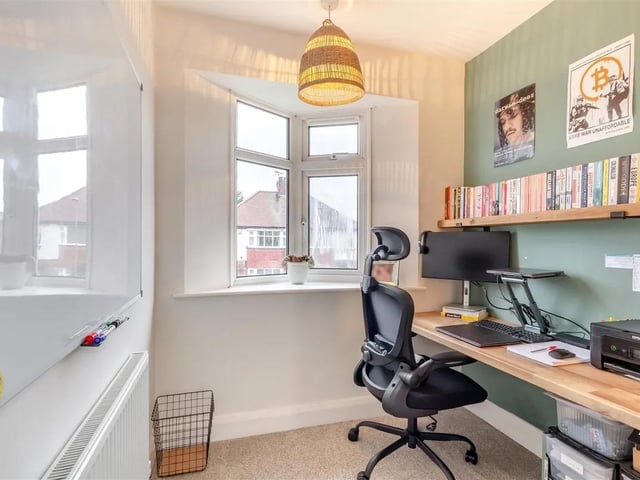 The property has ample bedroom space for a home office.