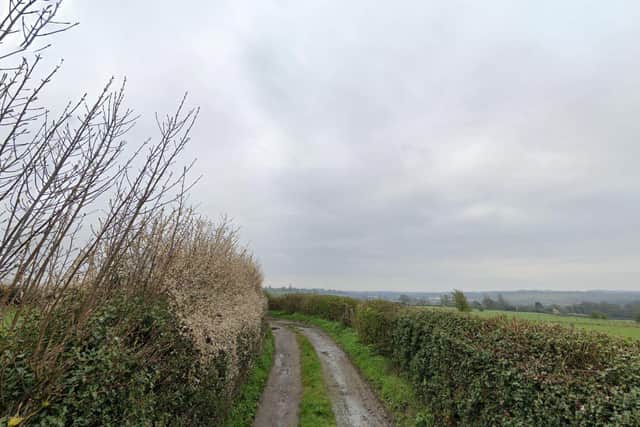 Access to the proposed site would come of the existing track in Mawkin Lane. Photo: Google