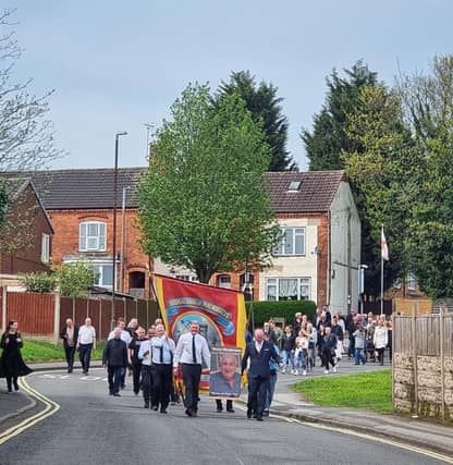 A march was led by the ex-mining committee.