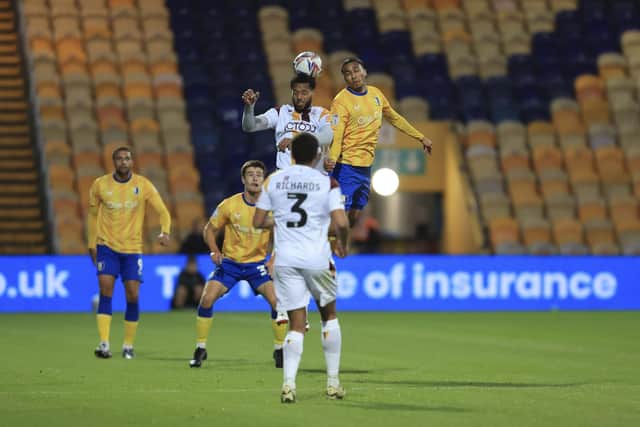 Mansfield Town exited the Bristol Street Motors Trophy after defeat to Bradford City.