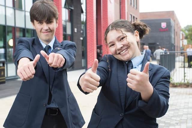 Children celebrating their new school