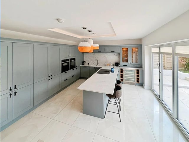 The standout feature is the impressive open-plan kitchen, dining, and living area-designed as the true heart of the home.