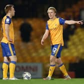George Lapslie is one of two Mansfield Town players in the League Two team of the year, according to the whoscored.com website.