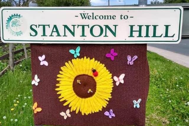 Before the vandalism: Kay Wallis's creation on the Stanton Hill name-sign.