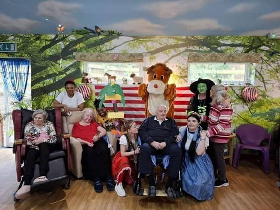 The team and family members at Wren Hall celebrating World Book Day.