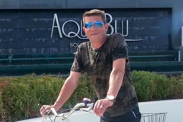 Dave Topping is pictured on holiday on a bike ride