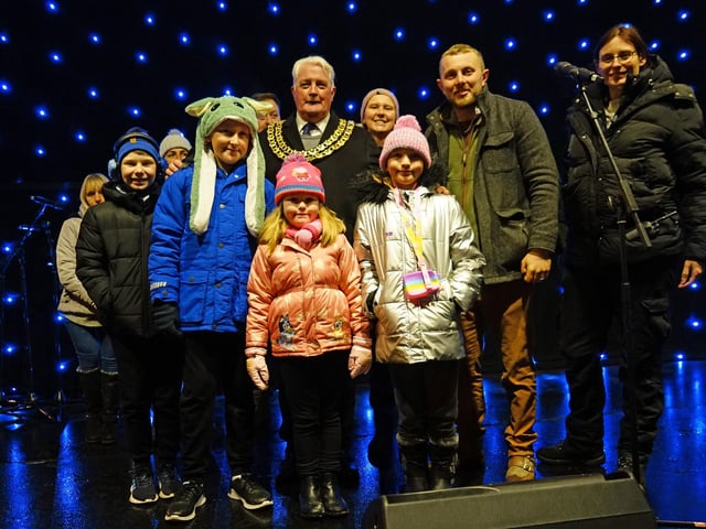 Ashfield Council chairman Arnie Hankin, together with deputy leaders Tom Hollis and Helen-Ann Smith turned on the lights, with some young helpers.