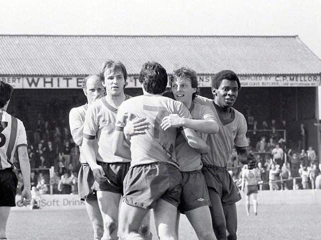Mansfield celebrate scoring against Rochdale.