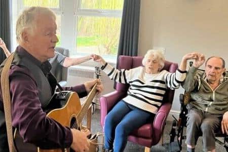 Singer Johnny Jalland entertains residents at Clipstone Hall and Lodge care home during an afternoon of musical entertainment there earlier this year.