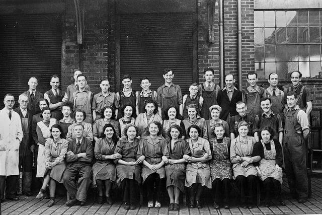 Another from Mansfield's Fairbrothers Factory. Press Shop staff with foreman Mr Bestwick.