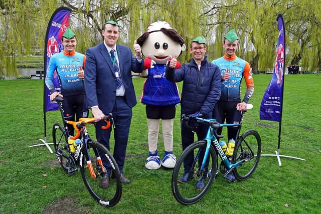 Two of the Tour Of Britain riders, Mansfield's Ross Lamb (far right) and Ollie Peckover, of Ruddington, who both compete for the Ribble Weldtite pro team, celebrate the race coming to Mansfield again, with the Mayor of Mansfield, Andy Abrahams, James Biddlestone, of Mansfield District Council, and Tobi, the Tour Of Britain mascot.