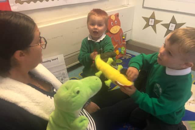 Mrs Ward, Cameron and Teddy having a snappy story as they return to Oak Tree Primary & Nursery.