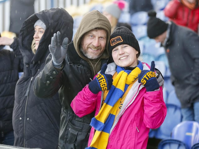 Stags fans watch the Sky Bet League 2 match against Crewe Alexandra at the One Call Stadium.